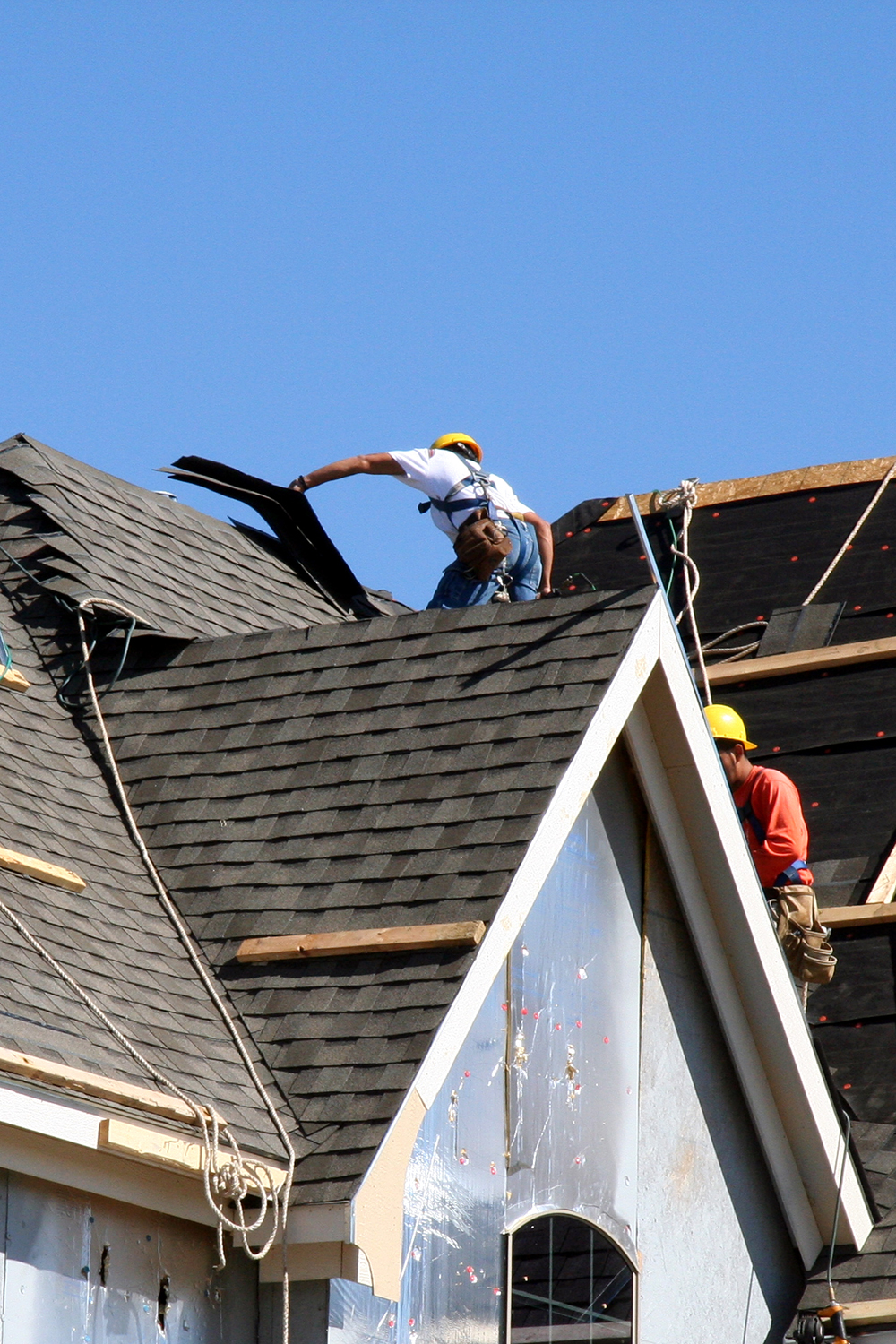 DRS roofers putting on new shingles